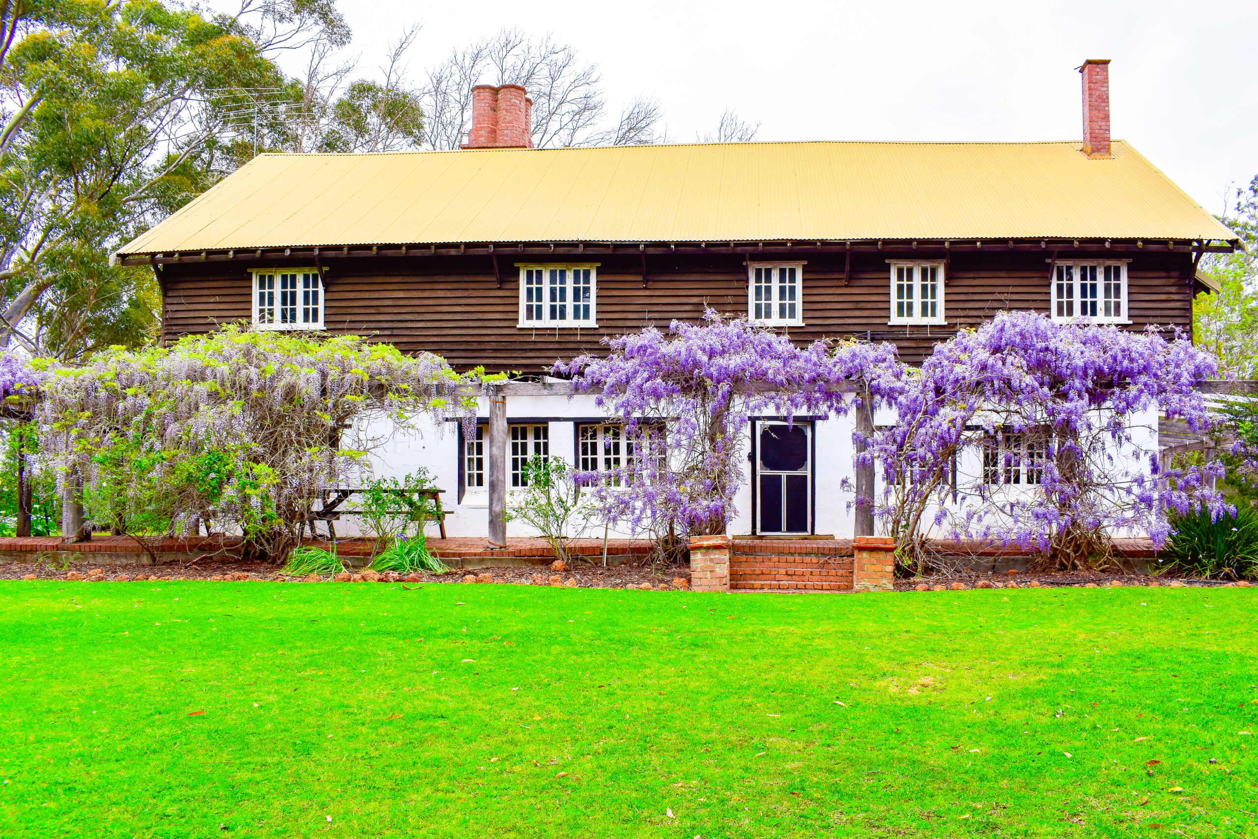 Fairbridge Village's large accommodation house is surrounded by vibrant outdoor plants