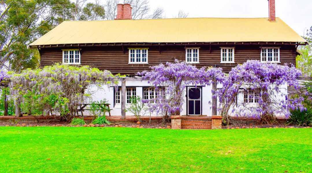 Fairbridge Village’s large accommodation house is surrounded by vibrant outdoor plants Fairbridge Village's large accommodation house is surrounded by vibrant outdoor plants